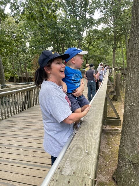Nana and Granson watch the leopard at Cape May Zoo.